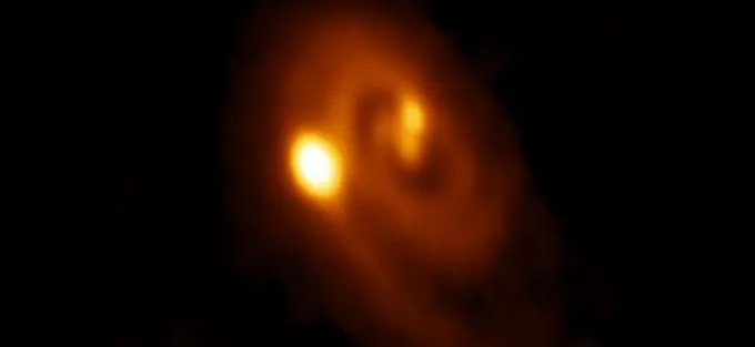 Astronomers witness the birth of a stellar triple 