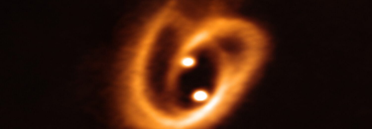 One cosmic pretzel for two baby stars